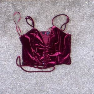 Maroon velvet cropped top.